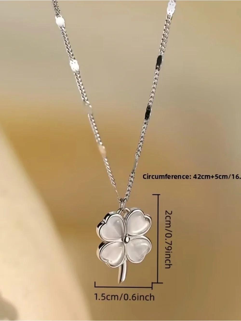 silver-tone four-leaf clover necklace white, pearlescent pendant shimmery chain